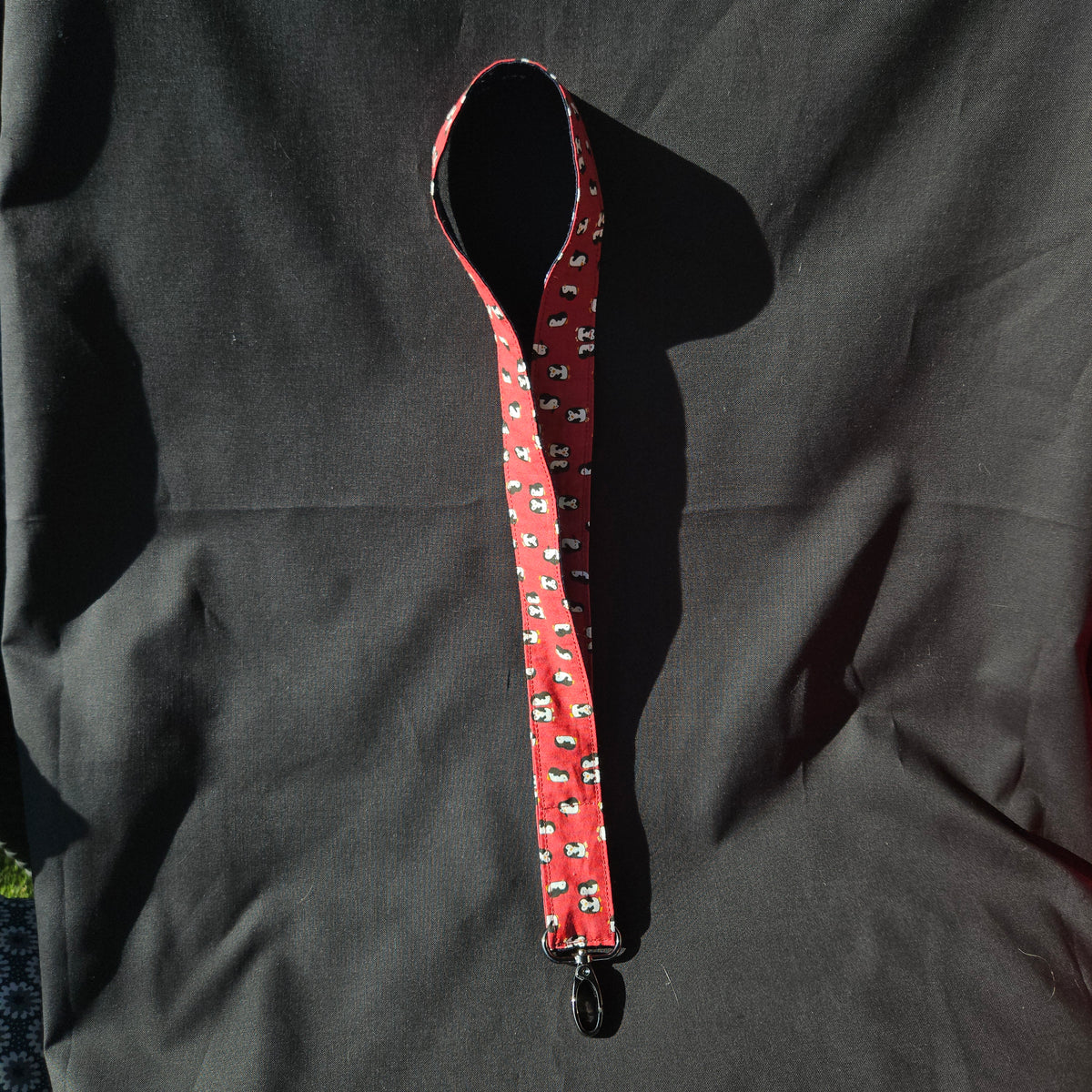 Doublure du tour de cou en tissu pingouins rouge