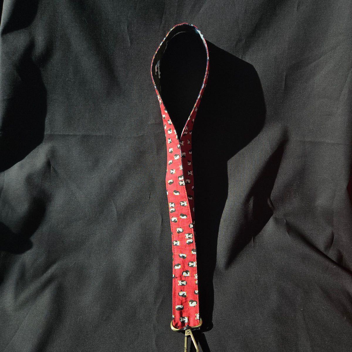 Doublure du tour de cou en tissu pingouins rouge
